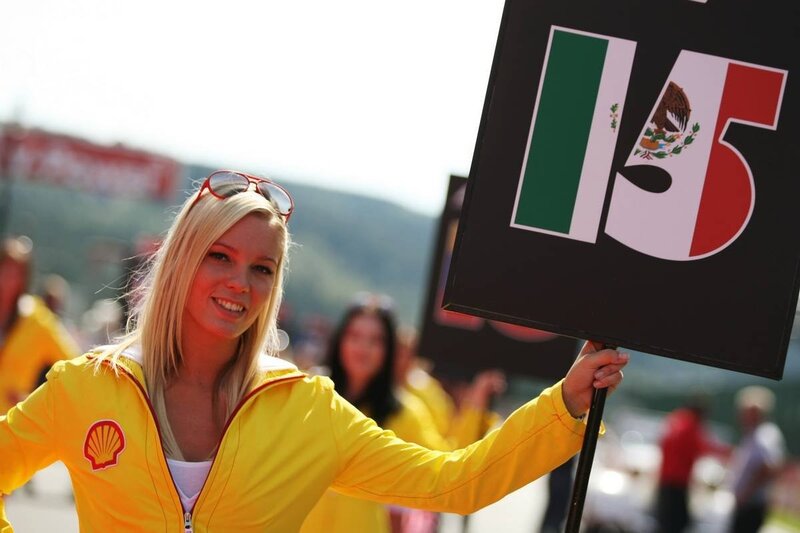 Woman holding race number sign