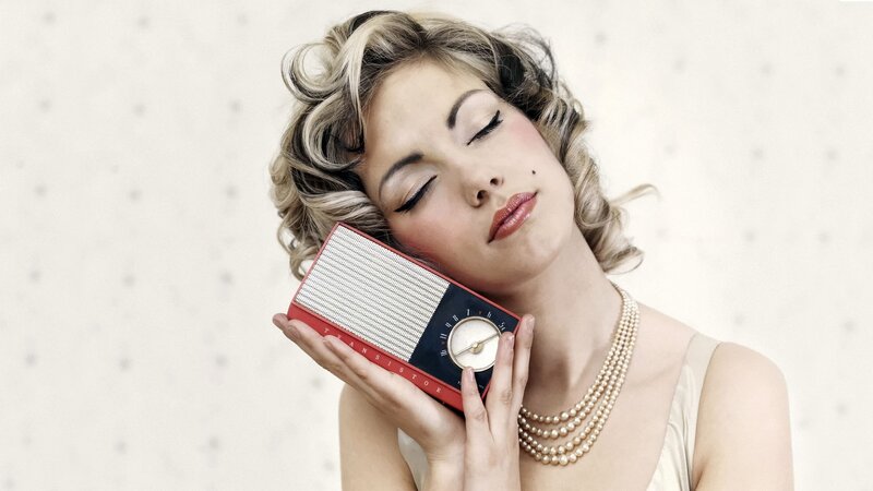 Woman Holding Radio — Beige