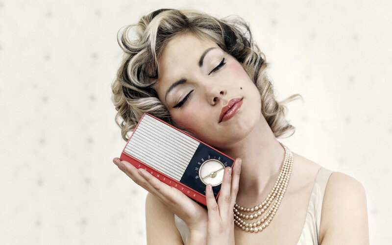 Woman Holding Radio