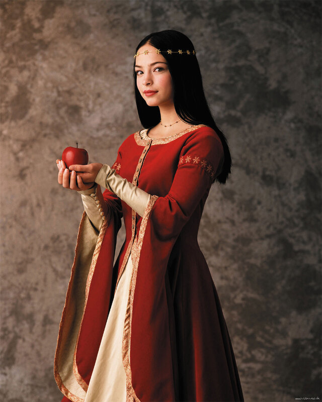 woman holding red apple