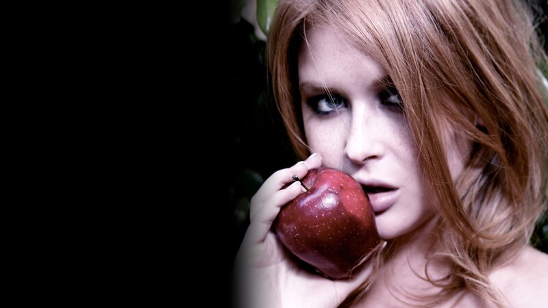 woman holding red apple