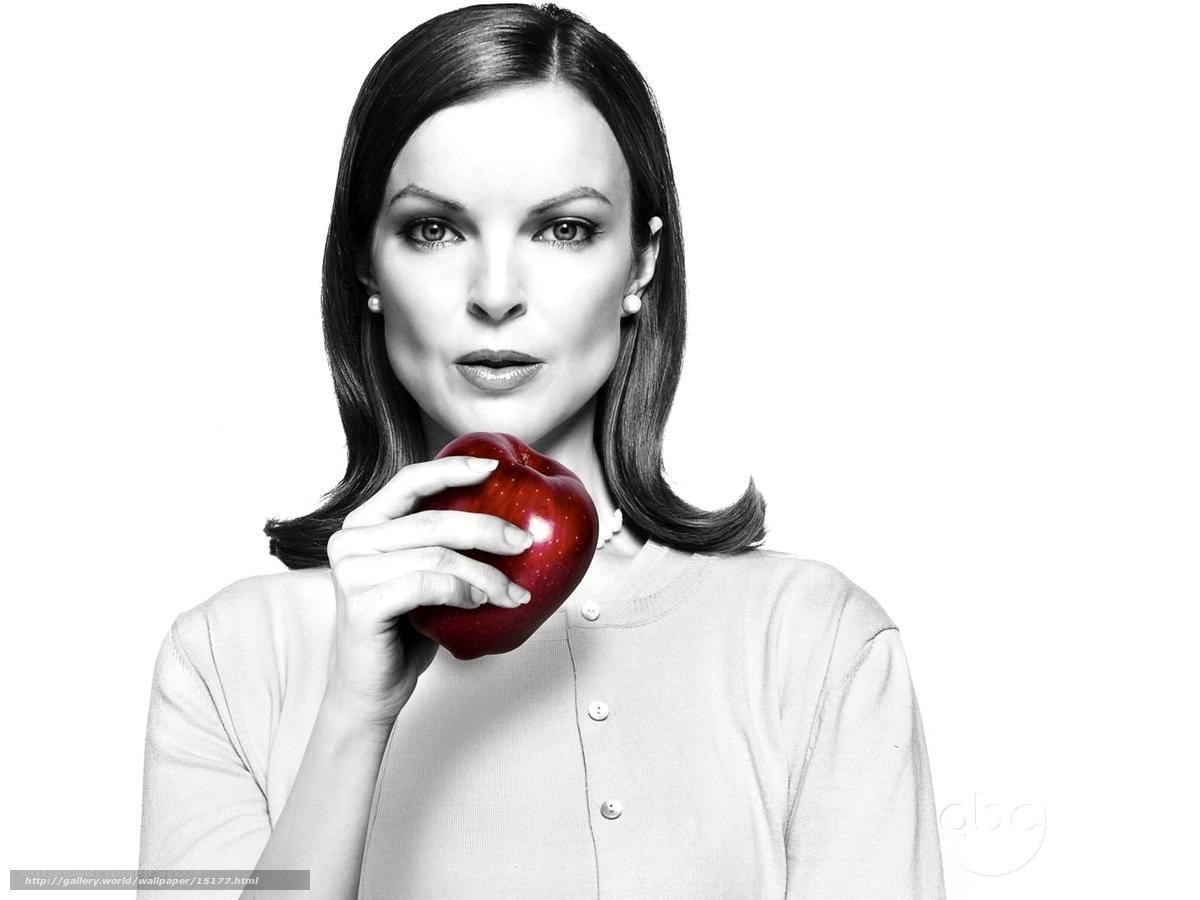woman holding red apple