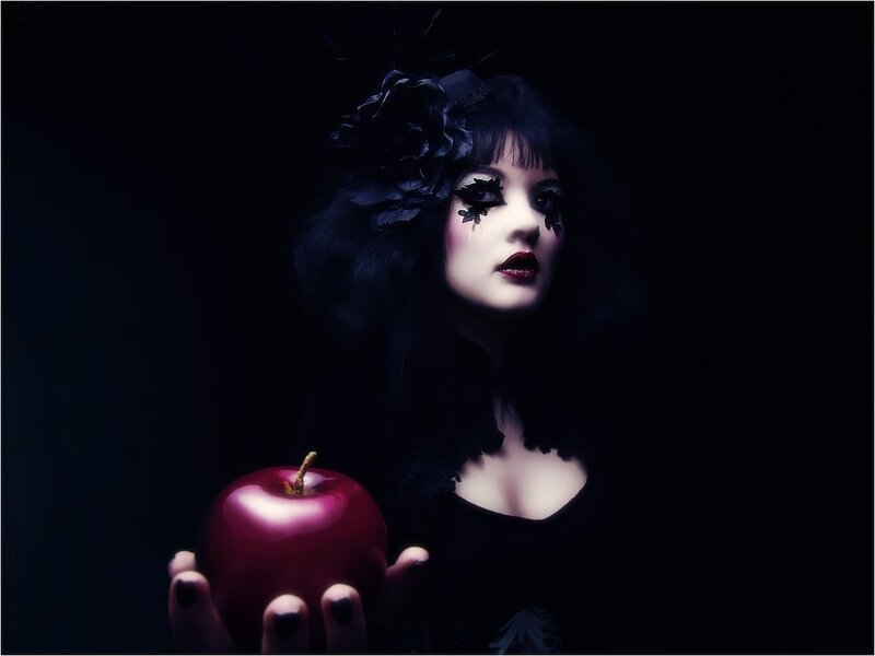 woman holding red apple