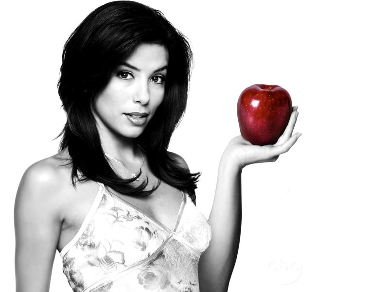 woman holding red apple