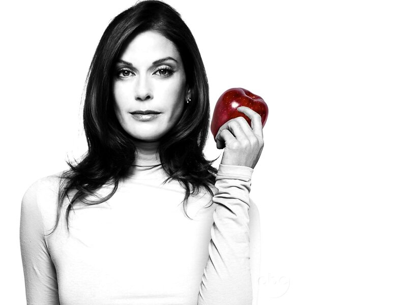 woman holding red apple