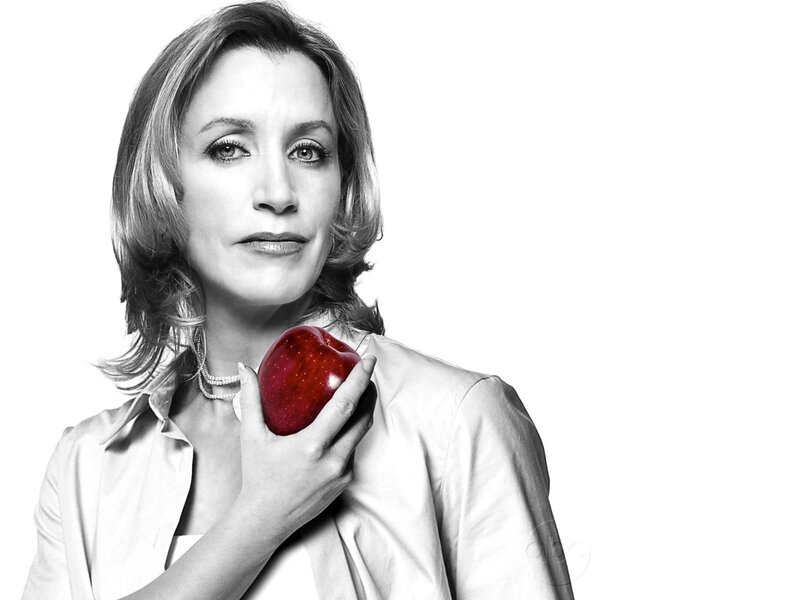 woman holding red apple