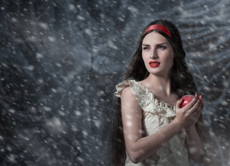 Woman Holding Red Apple — White, Dramatic, Winter, Photograph