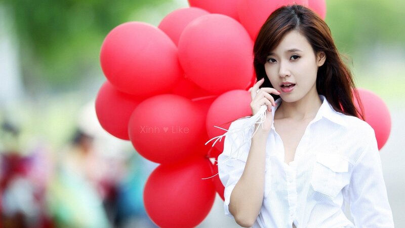 Woman Holding Red Balloons — Calm, Afternoon, Photograph, Shirt