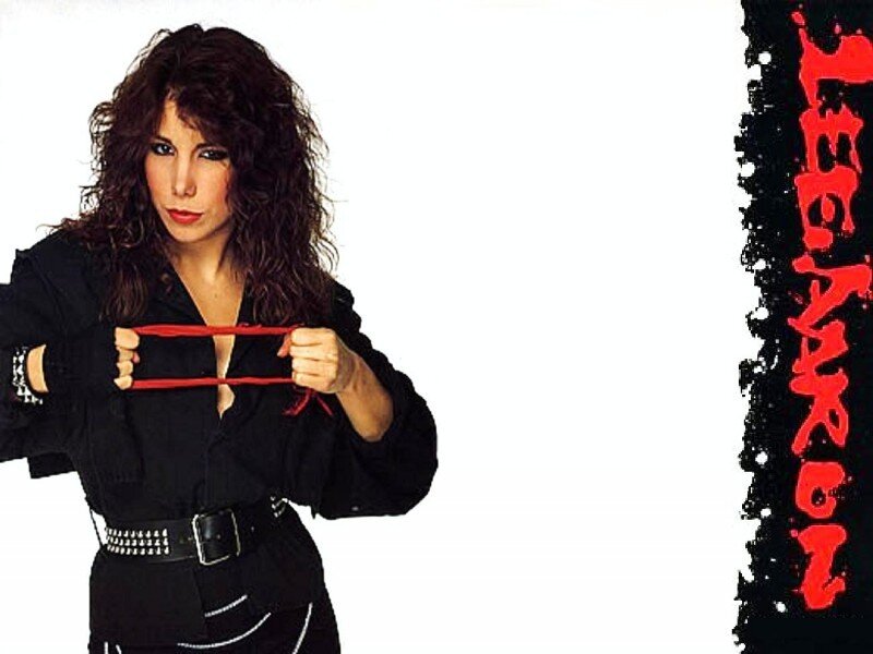 woman holding red band