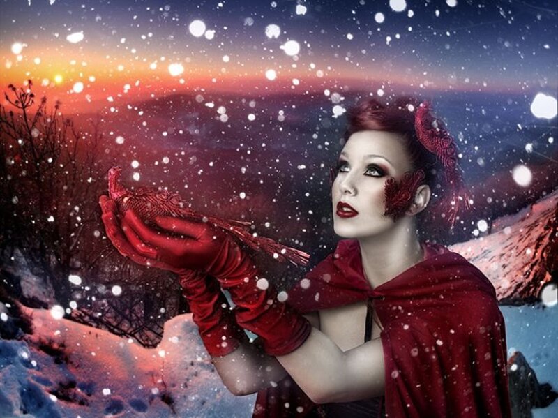 Woman Holding Red Bird