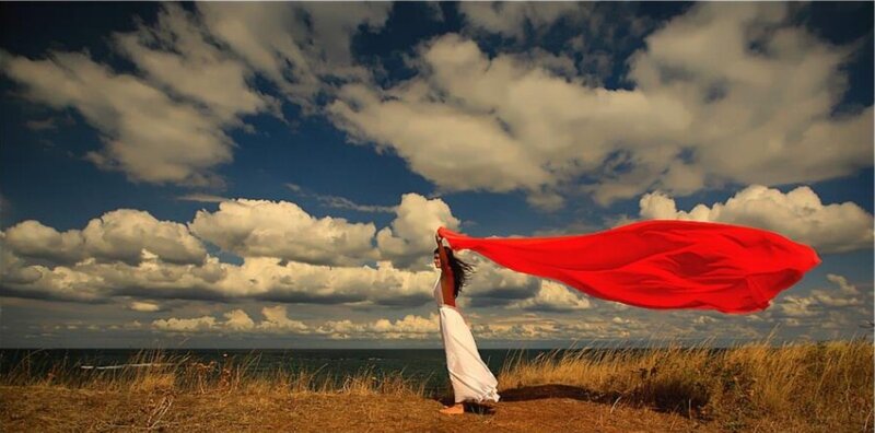 Woman Holding Red Cloth