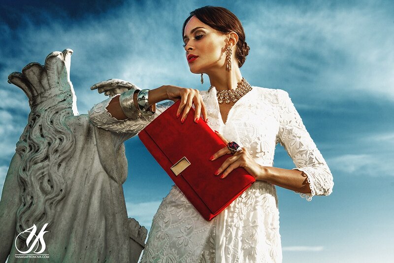 Woman Holding Red Clutch — White