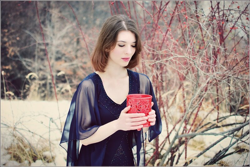 Woman Holding Red Cup