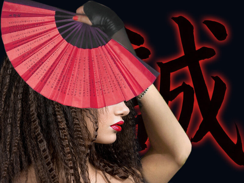 Woman Holding Red Fan