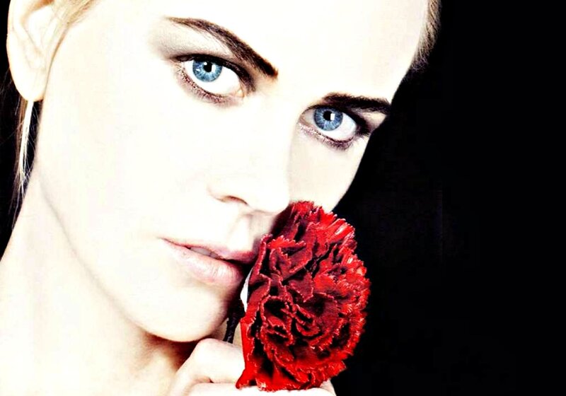 Woman Holding Red Flower — Dramatic, Photograph, Blue Eyes