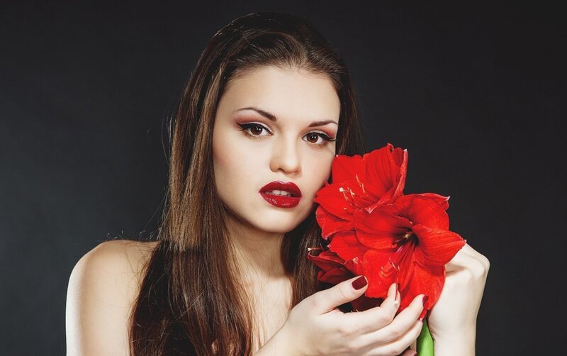 Woman Holding Red Flower — Dramatic, Photograph, Makeup