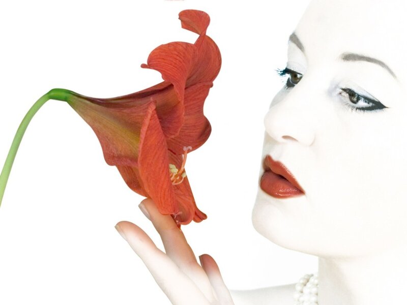 Woman Holding Red Flower — Dramatic, Photograph
