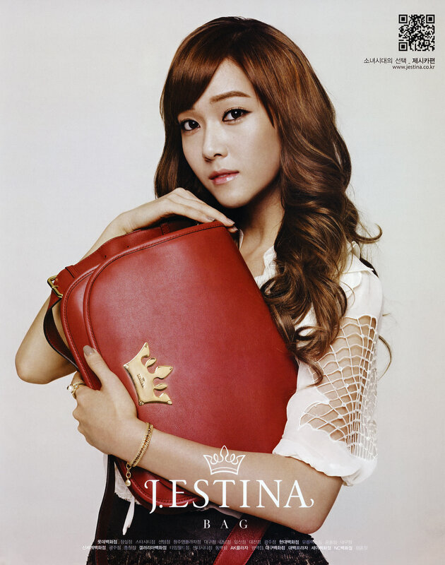 woman holding red handbag