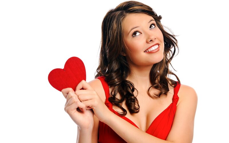 woman holding red heart