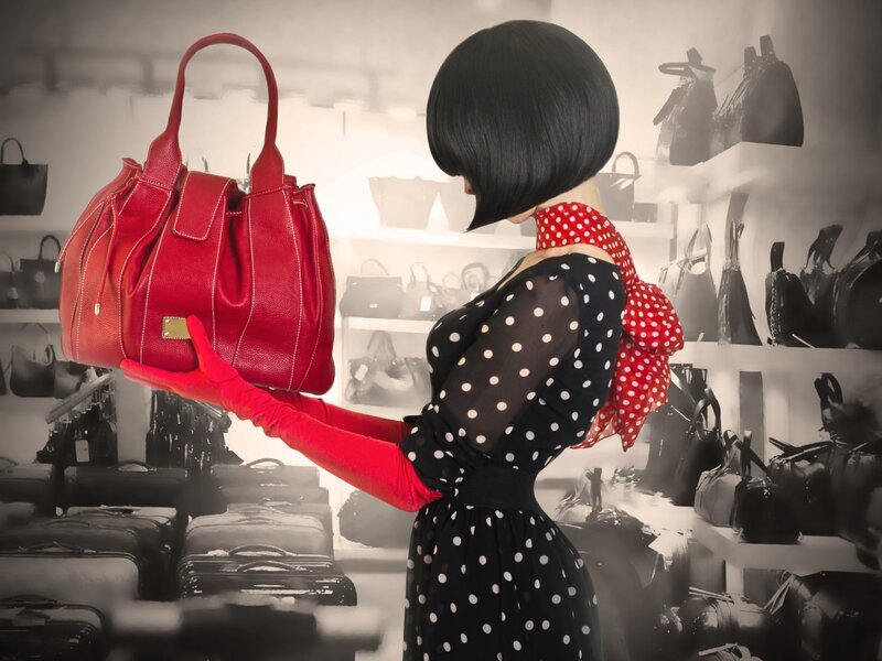 Woman Holding Red Purse