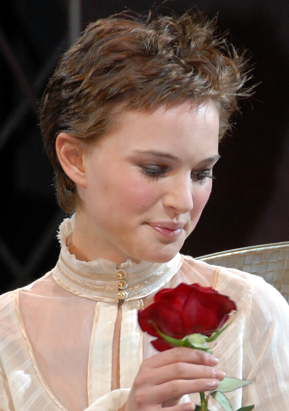 woman holding red rose