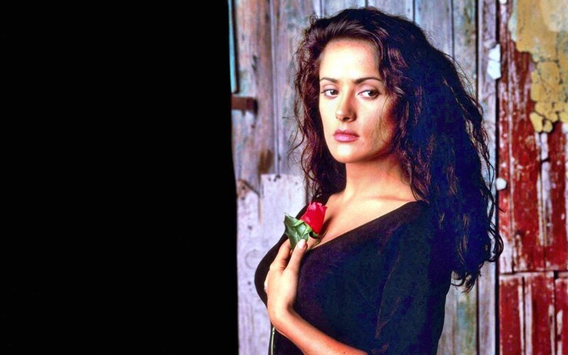 woman holding red rose