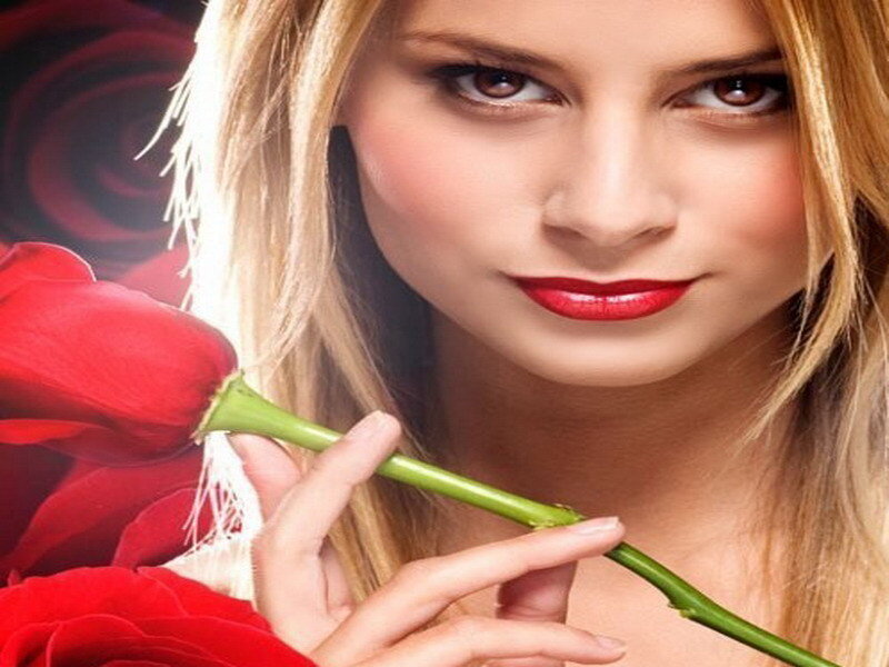 woman holding red rose
