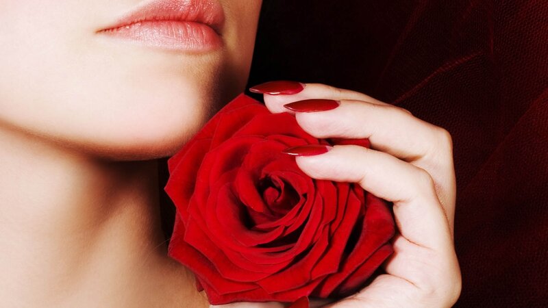 woman holding red rose