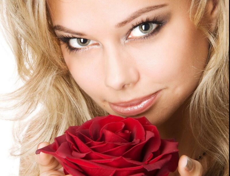 Woman Holding Red Rose — Calm