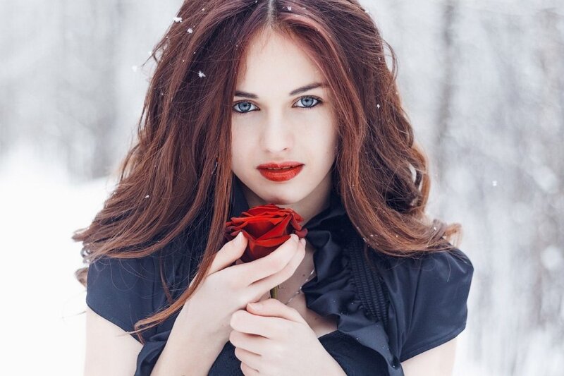 Woman Holding Red Rose — Cold