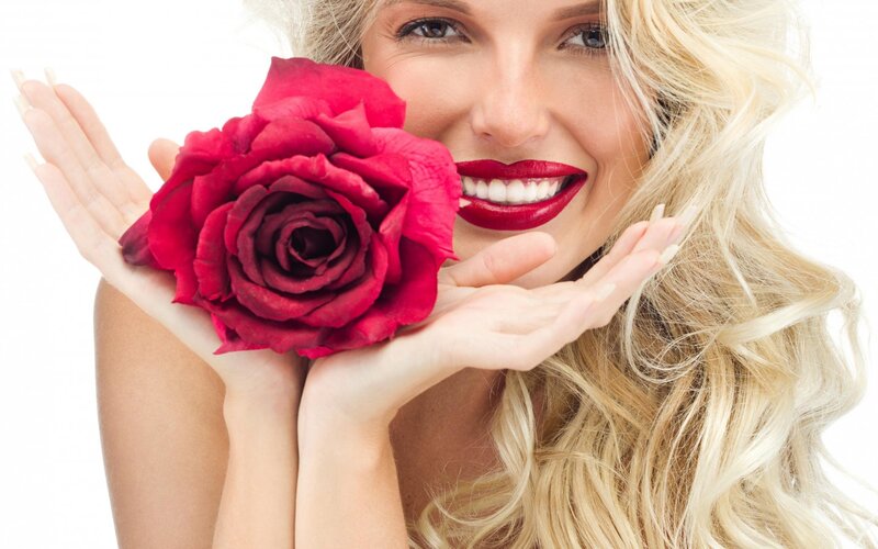 Woman Holding Red Rose — Happy