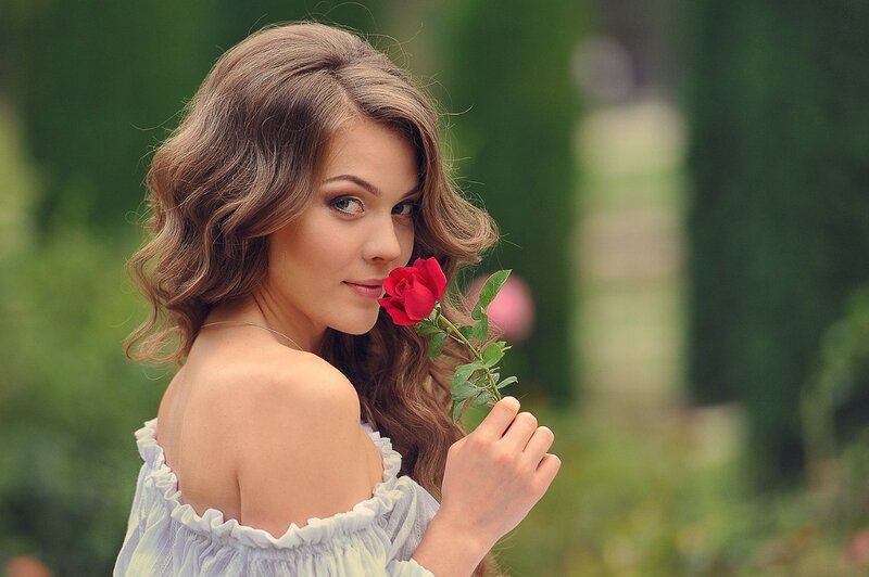 Woman Holding Red Rose — Serene, Afternoon, Photograph