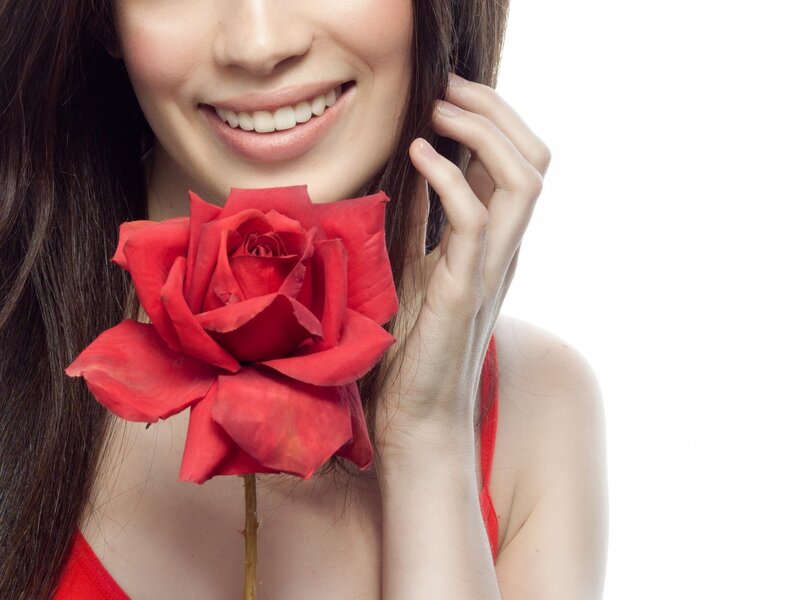 Woman Holding Red Rose — Serene