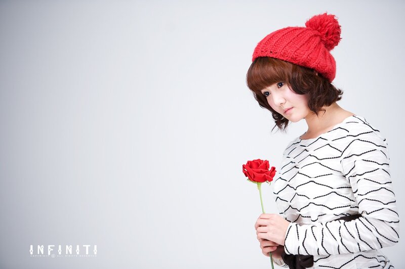 Woman Holding Red Rose — White, Calm