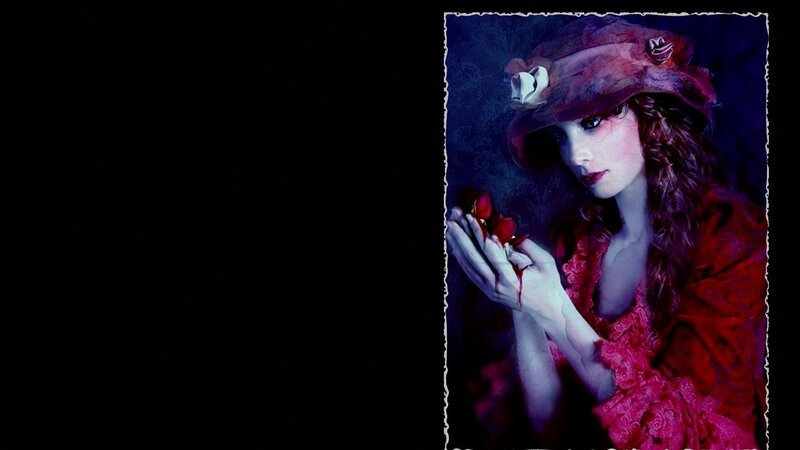 woman holding red roses