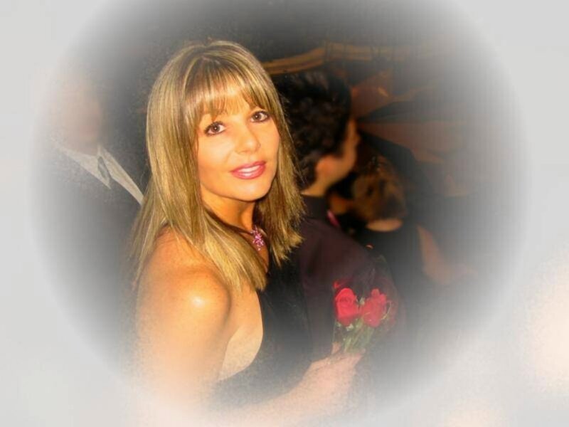 woman holding red roses