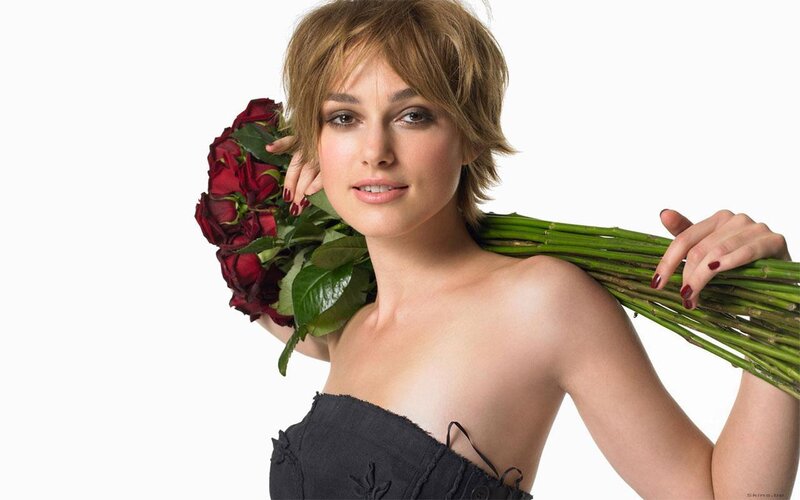 Woman holding red roses