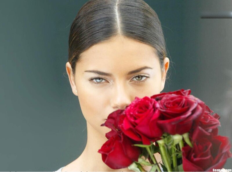 Woman Holding Red Roses — Calm, Photograph