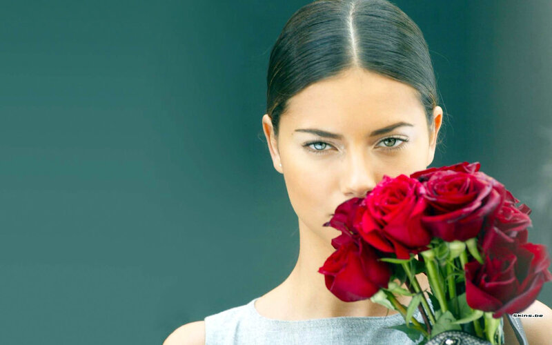 Woman Holding Red Roses — Calm