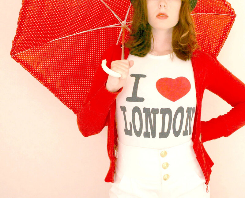 Woman Holding Red Umbrella — Confident
