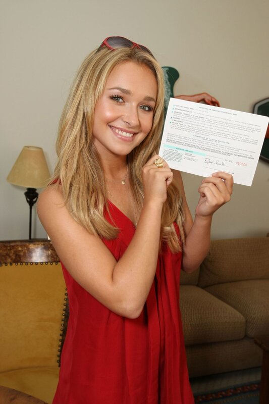 woman holding registration form