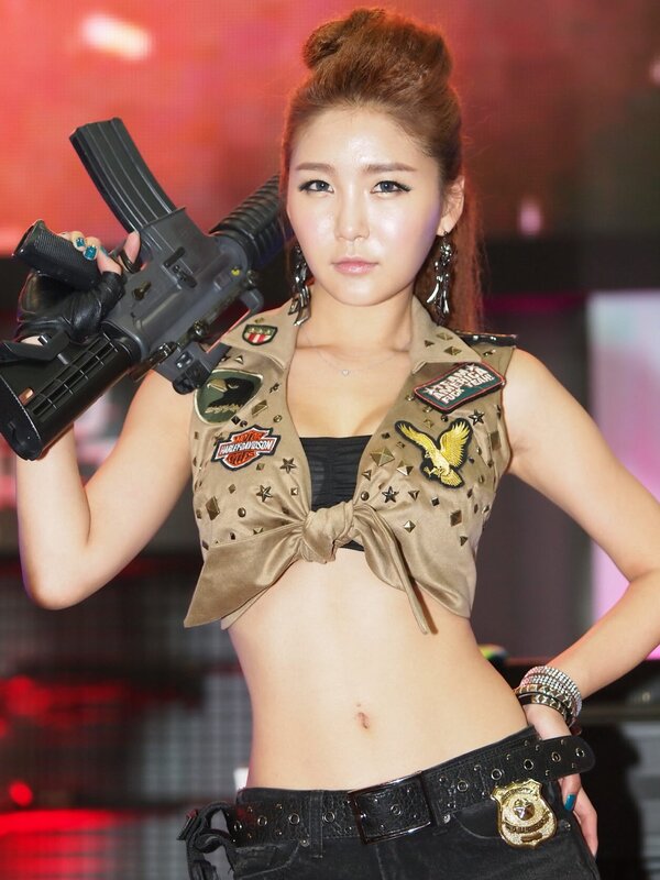 woman holding replica gun