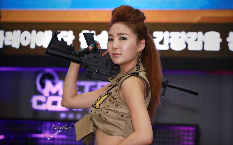 woman holding replica gun