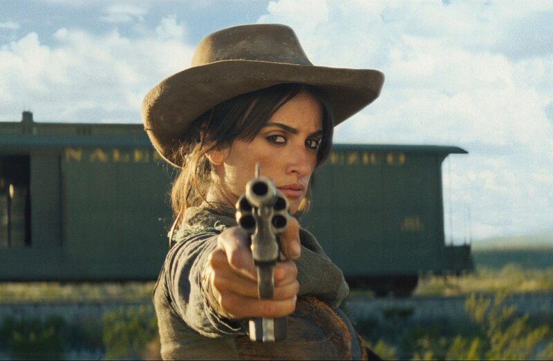Woman Holding Revolver — Brown, Dramatic, Afternoon