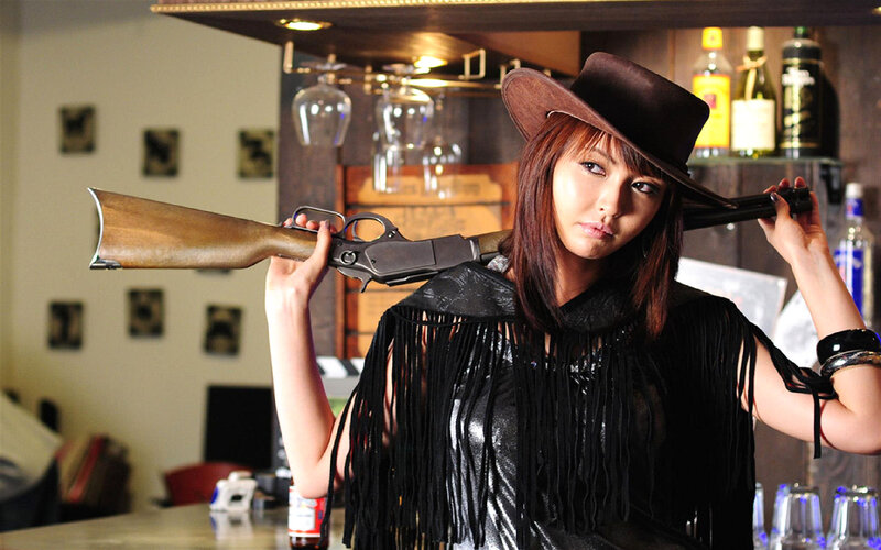 Woman Holding Rifle — Black, Dramatic, Photograph, Cowboy Hat
