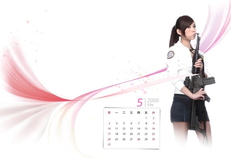 woman holding rifle with calendar