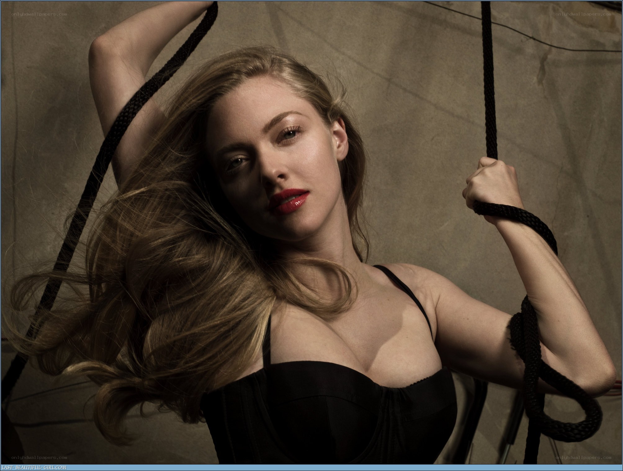 woman holding ropes in studio
