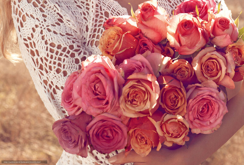 woman holding rose bouquet