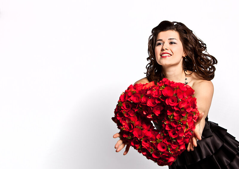 Woman Holding Rose Heart