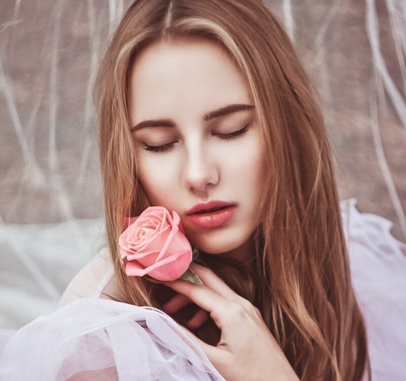 Woman Holding Rose — Pink, Serene, Photograph, Veil